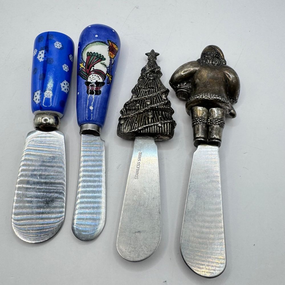4 Christmas‎ cheese spreaders 1 is JO!E 2 may be unmarked silver heavy